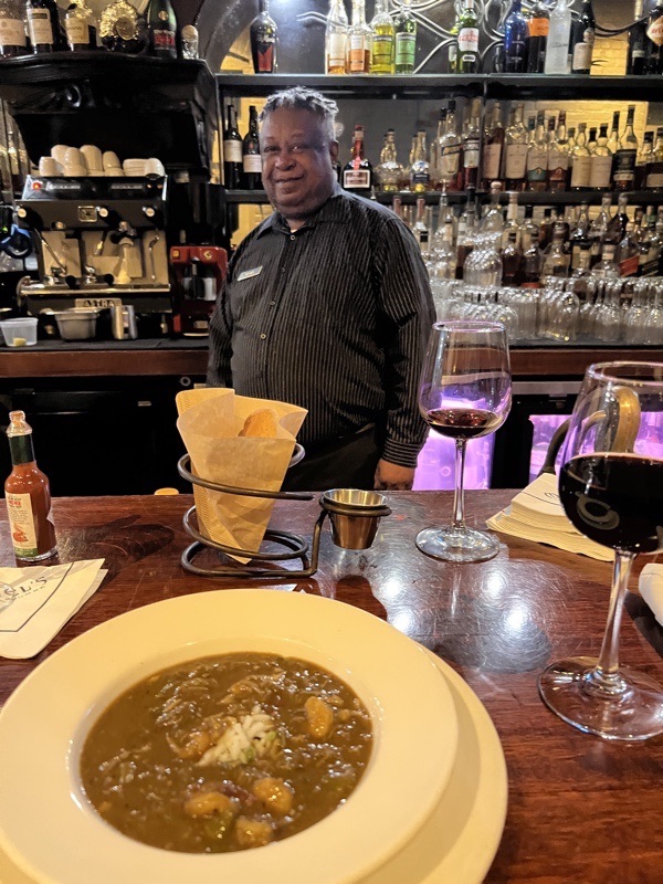 Michael serving me gumbo